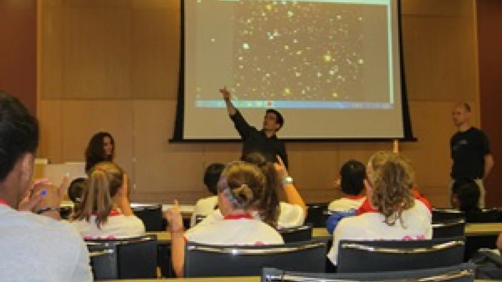 Picture of seminar being held in the Smith Seminar Room in the Physics Research Building