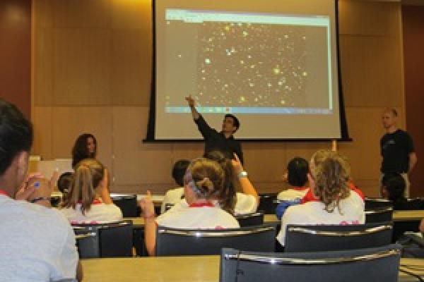 Picture of seminar being held in the Smith Seminar Room in the Physics Research Building